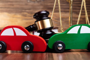 Car Accident Lawyer Monmouth County, NJ - Two Green And Red Wooden Cars