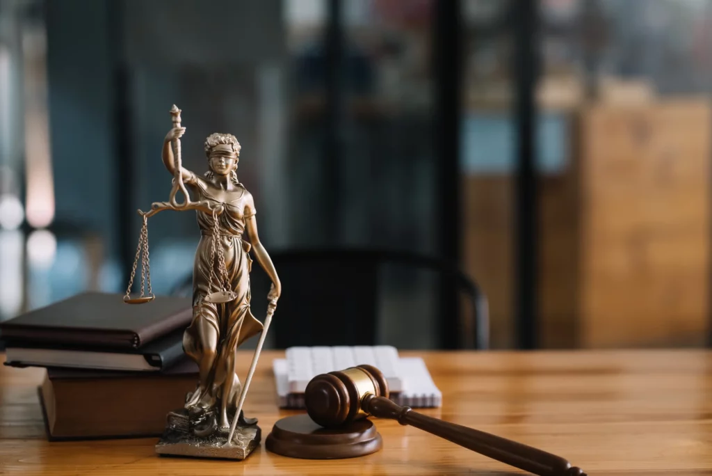 statue-of-lady-justice-on-desk-of-a-lawyer (1)